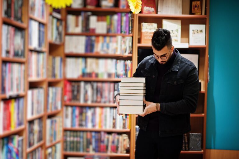 Arab student man at library