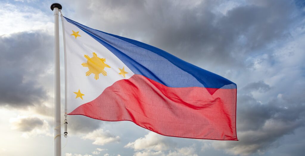 Philippines flag waving against cloudy sky